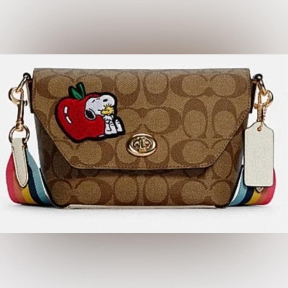 COACH X PEANUTS KARLEE CROSSBODY SIGNATURE CANVAS WITH SNOOPY